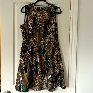 Jennifer Lopez, sleeveless cocktail dress, animal print